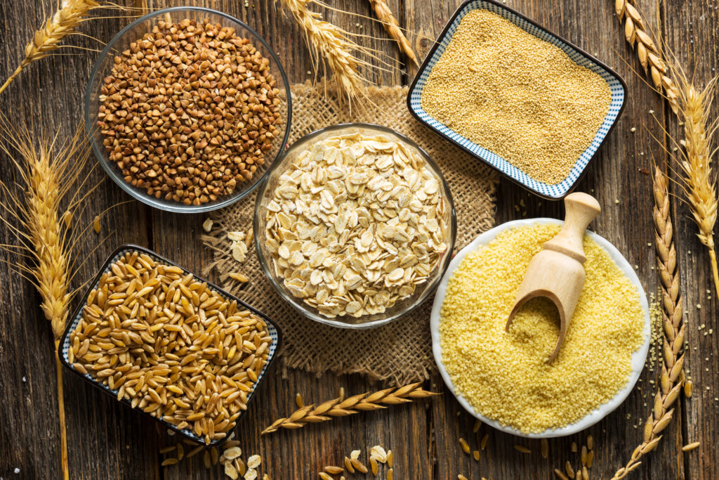 Cereals and grains collection on wooden background