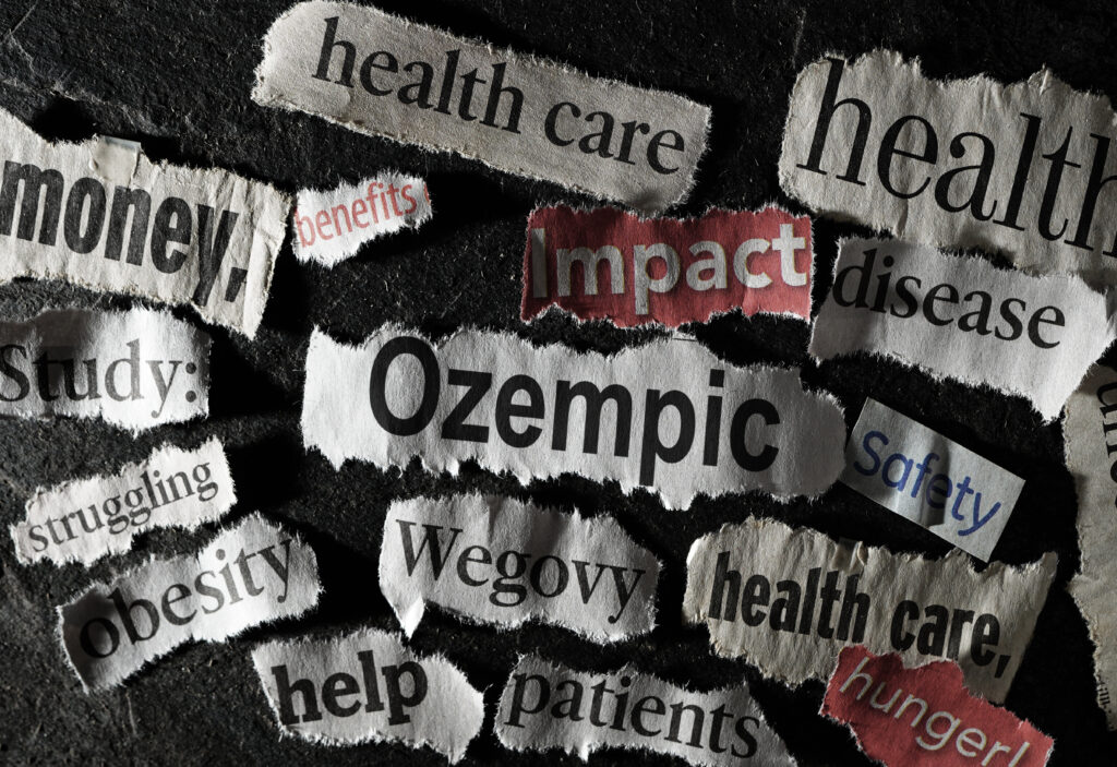 Newspaper headlines related to Wegovy and Ozempic weight loss drugs and obesity By zimmytws adobe stock